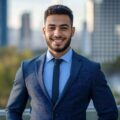Confident businessman in a suit smiling on a balcony with city skyline